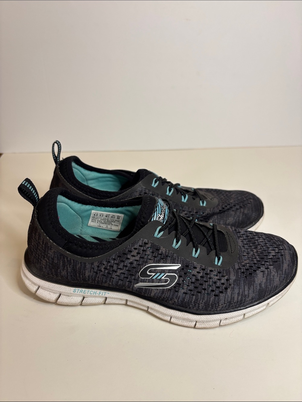 Skechers Women's Black Sneakers with Teal Accents